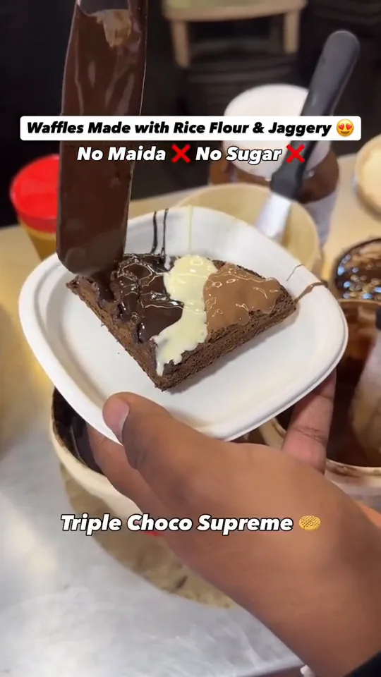 A Triple Choco Supreme waffle plated with cream